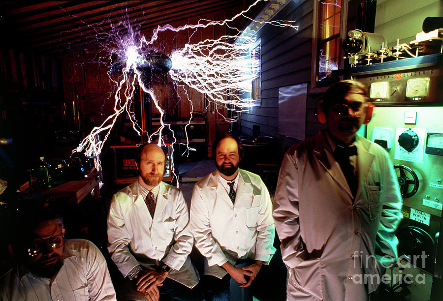 Tesla Coil Builders Assoc. With nemesis Coil Photograph by Peter Menzel/science Photo Library