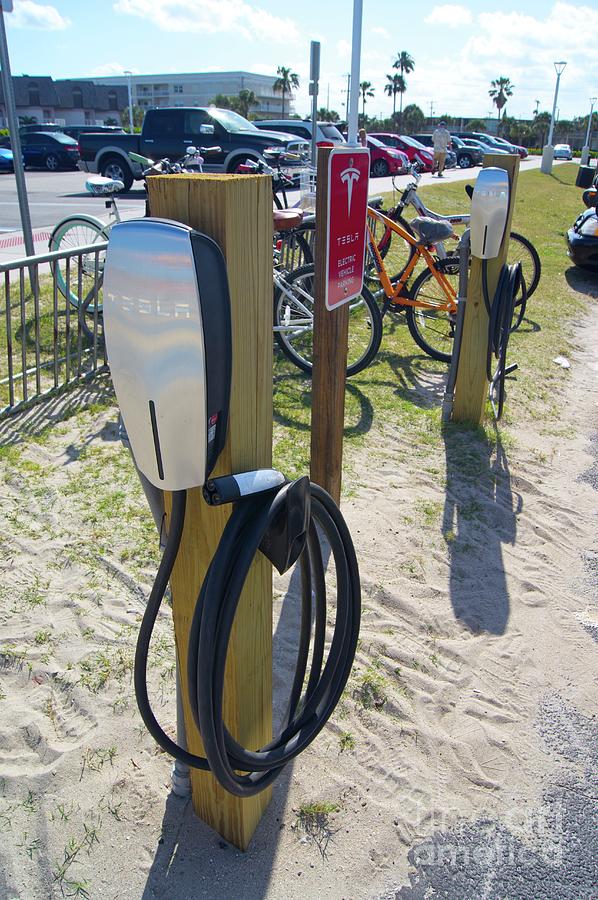 Beach Photograph - Tesla Recharging Station At Cocoa Beach by Mark Williamson/science Photo Library