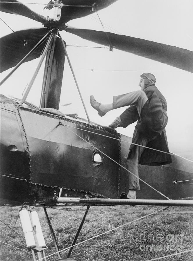Test Pilot Entering Plane Photograph by Bettmann