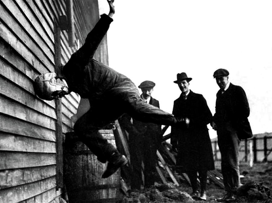 Testing Football Helmets - circa 1913 by Doc Braham Testing Football Helmets - circa 1913 by Doc Braham