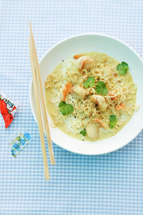 Thai Curry Soup With Prawns And Noodles Photograph by Michael Wissing