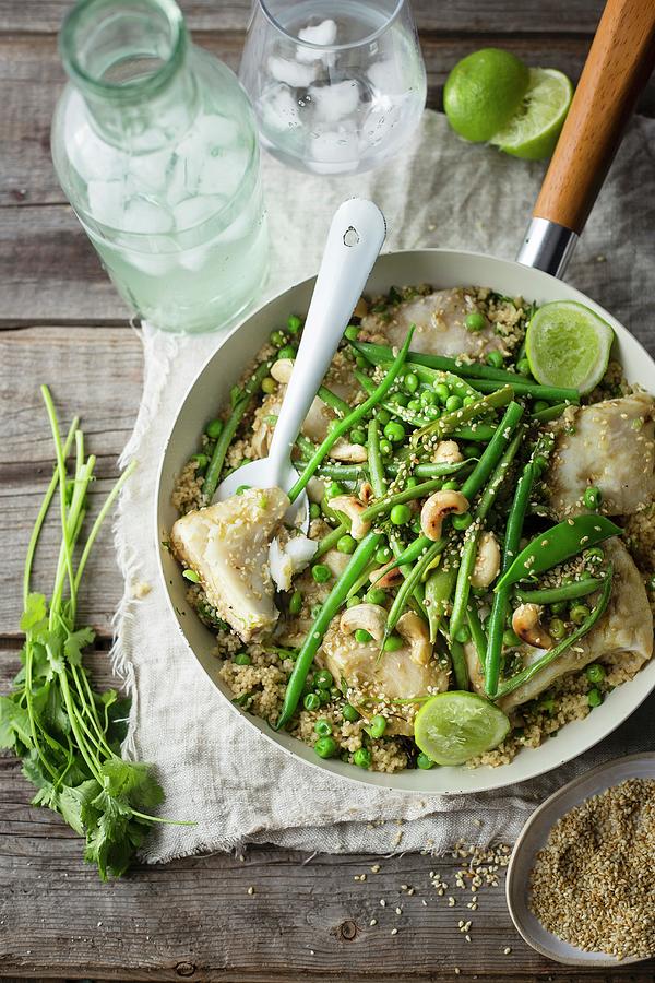 Thai Fish Dish With Green Beans, Peas And Cashew Nuts On A Bed Of Couscous Photograph by Great Stock!