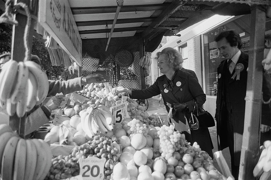 Thatcher Shops At Street Market Photograph by Larry Ellis