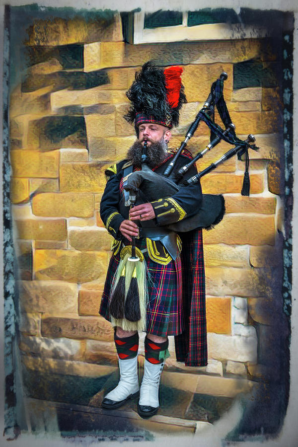 The Bagpiper In Full Dress Framed Photograph by Debra and Dave Vanderlaan