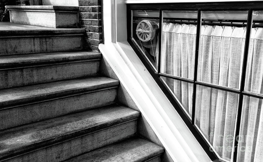 The Basement Window in Amsterdam Photograph by John Rizzuto