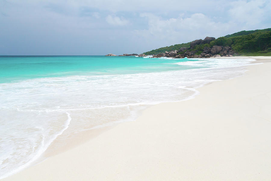 The Beach With White Sand And Turquoise Water With Waves Photograph by Cavan Images
