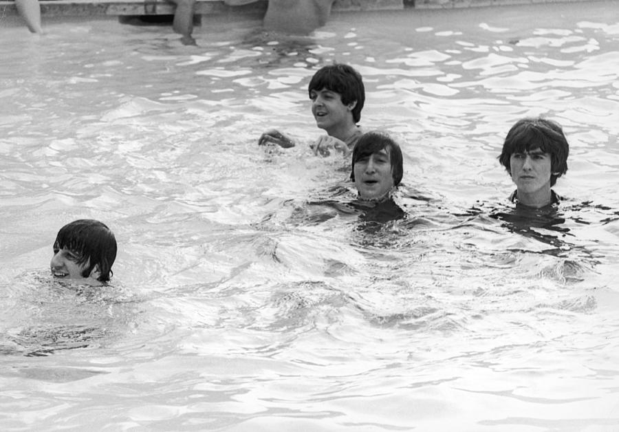 The Beatles Photograph - The Beatles In Swimming Pool by Express Newspapers