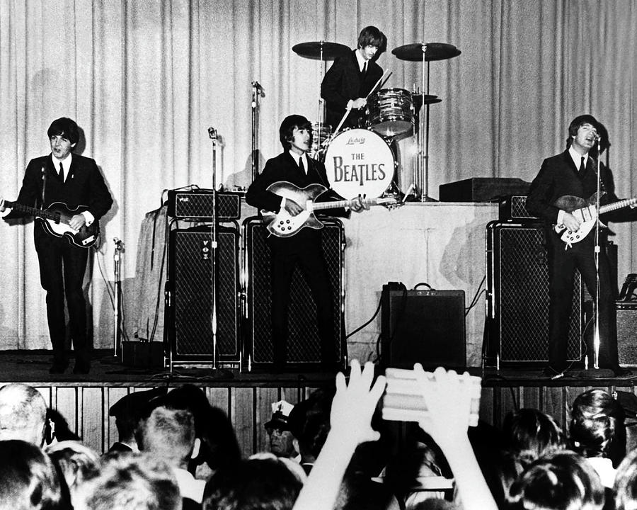 George Harrison Photograph - The Beatles On Stage by Globe Photos