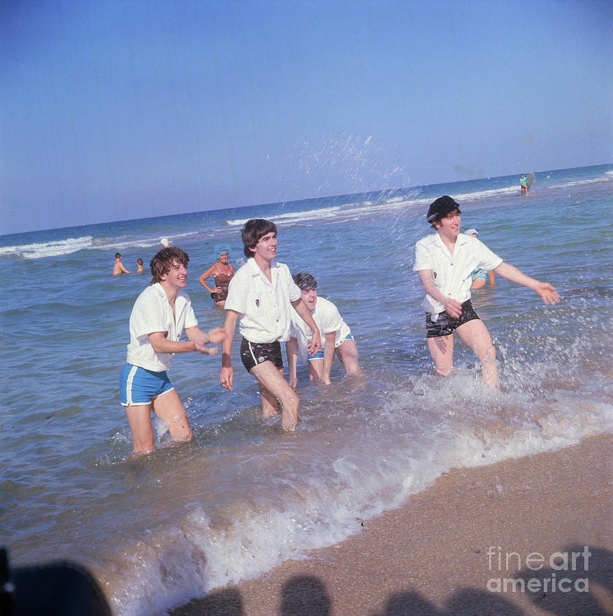 The Beatles Playing In Surf In Miami Photograph by Bettmann