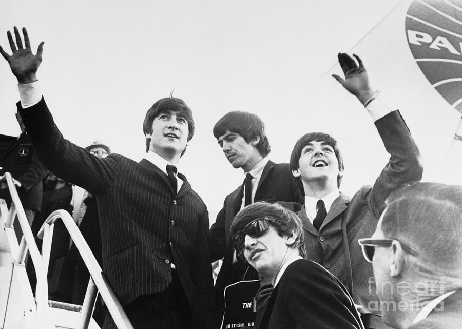 The Beatles Waving From Airplane by Bettmann
