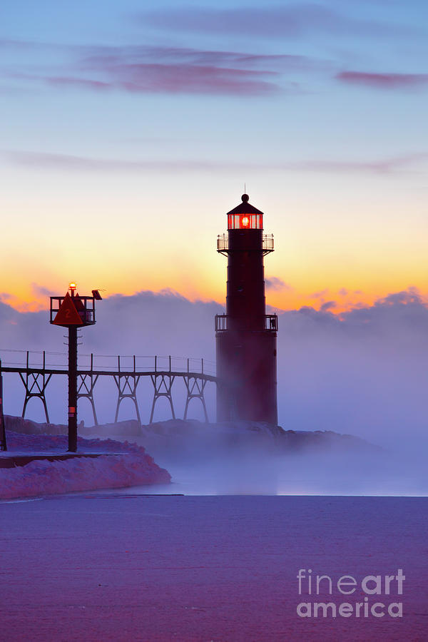 The Beautiful Algoma Wisconsin Lighthouse stands Sentinel in glowing 