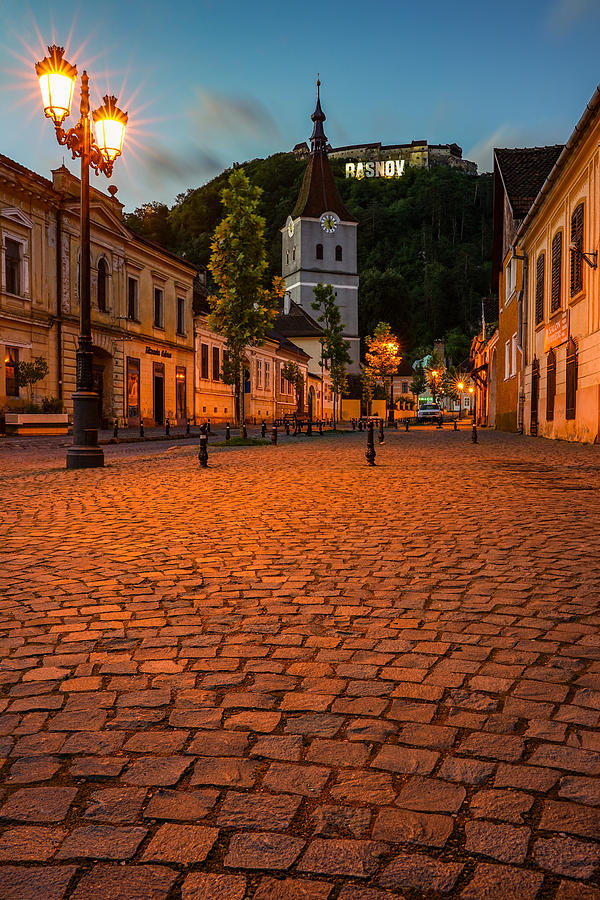 The Beautiful City Of Rasnov From Transylvania, Romania, Seen At Blue Hour. Photograph