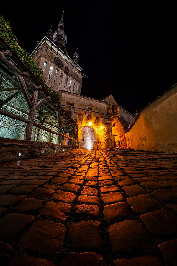 The Beautiful Medieval City Of Sighisoara From Transylvania, Romania, Seen At Night. Photograph
