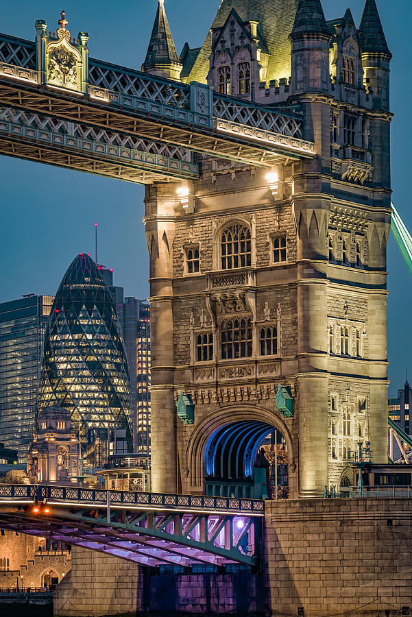 The beautiful Tower bridge in London seen at night Photograph by George Afostovremea