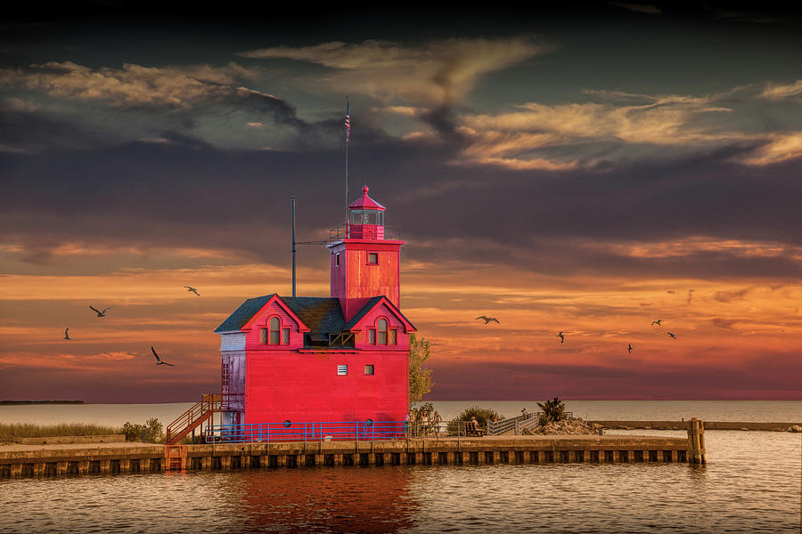 The Big Red Lighthouse at Sunset on Lake Michigan by Ottawa Beac Photograph by Randall Nyhof