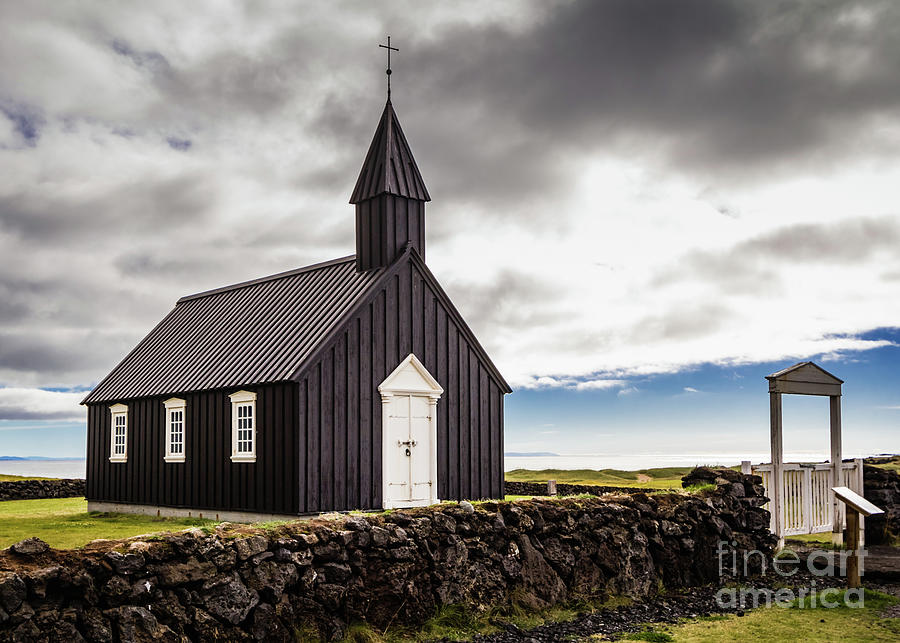 The black church of Budir, Iceland Photograph by Lyl Dil Creations