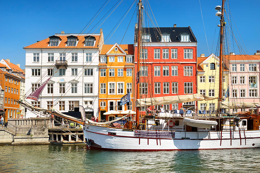 Architecture Photograph - The Boat In Nyhavn Canal, Copenhagen by Jan Wlodarczyk