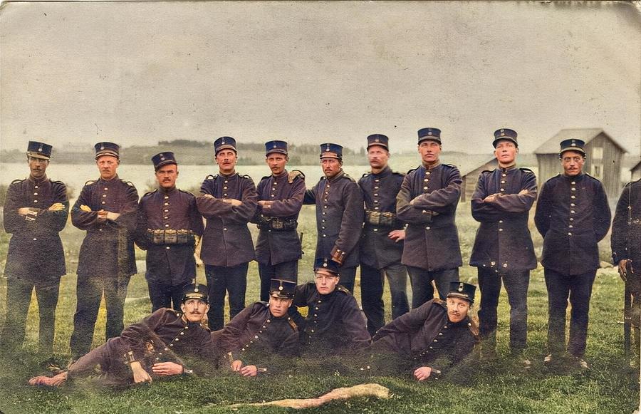 The border RPPC depicting a group of Swedish soldiers. On the right you can see a soldier armed with Painting by Celestial Images