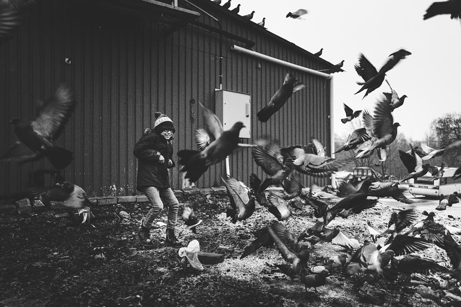 The Boy & The Birds Photograph by Alex Ogazzi
