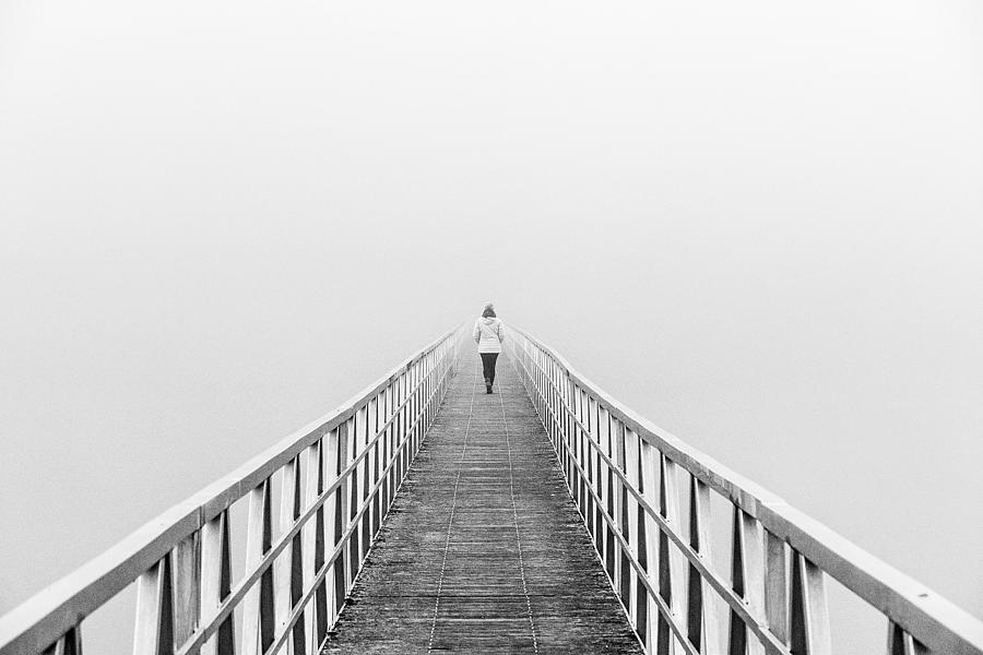 The Bridge And The Woman Dissolving In The Mist Photograph by Adolfo Urrutia