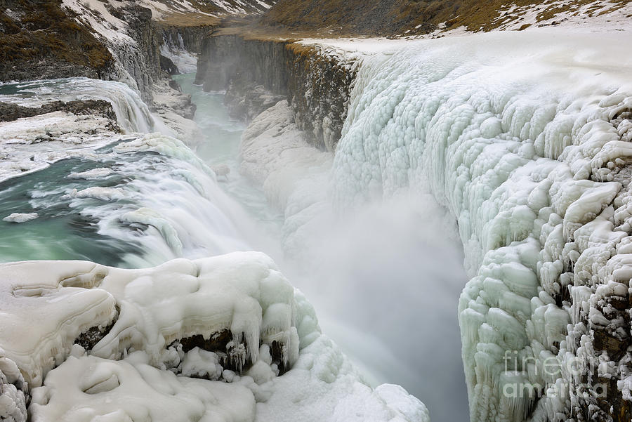 Icelands Gullfoss Waterfall Covered in Winter Ice Photograph by Tom Schwabel