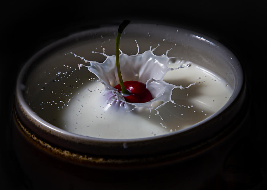 The Cherry In A Drop Of Milk Photograph by Oren Yacov