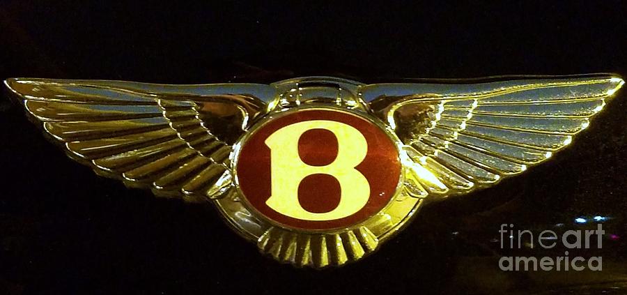 The Classic Bentley Logo Captured At Night Photograph by Poets Eye