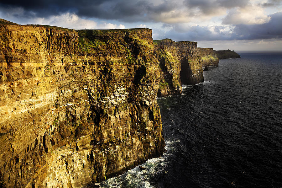 The Cliffs Of Moher In Evening Light Photograph by David Clapp
