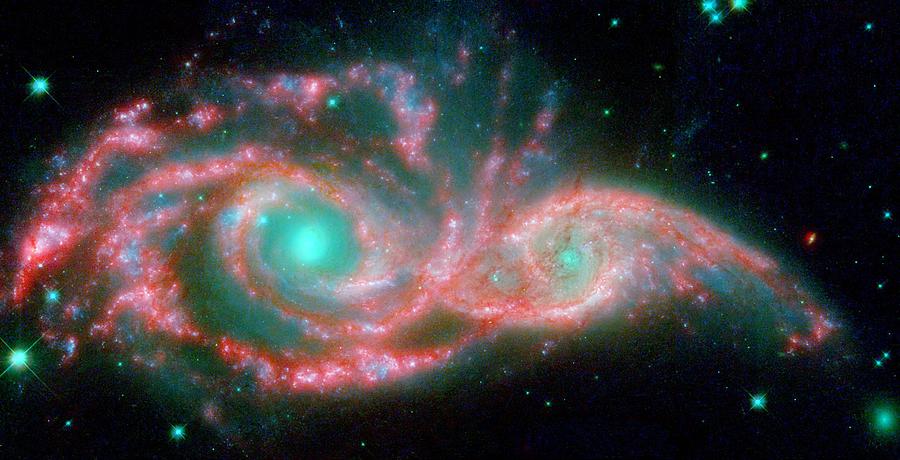 the cores of two merging galaxies, called NGC 2207 and IC 2163 Painting by Celestial Images