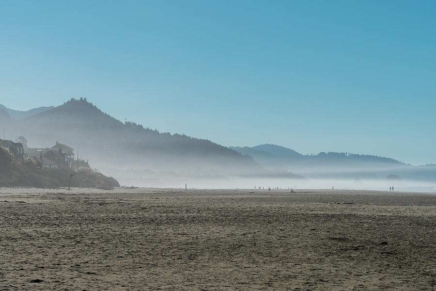 The Dense Ocean Mist Enters At Sunset In Cannon Beach, Oregon, Usa. Photograph