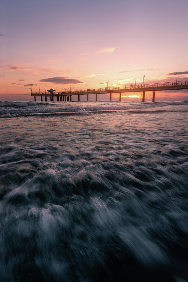 The Fiery pier - a pier at sunset in Versilia, Tuscany, Italy by Matteo Viviani The Fiery pier - a pier at sunset in Versilia, Tuscany, Italy by Matteo Viviani