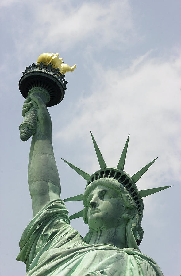 The Flame Of Liberty Is Held High Photograph by New York Daily News Archive