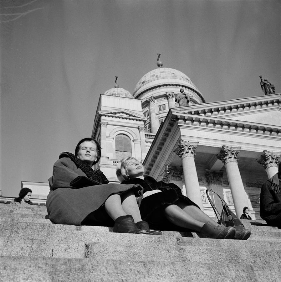 the friends enjoy the warmth on the steps of the Cathedral  Helsinki 22 2 1961  Photographer Arto Jo Painting by Celestial Images