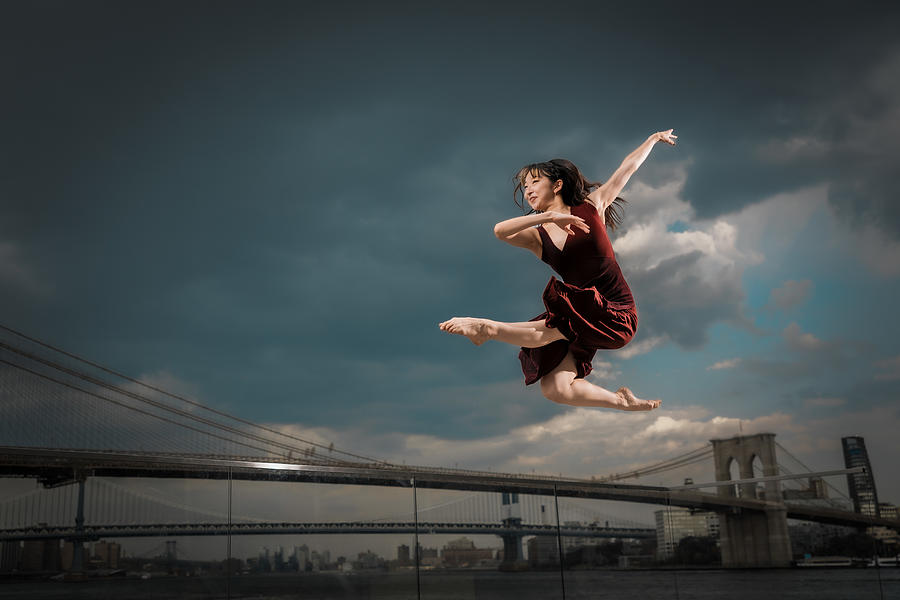 The Girl Dancing In The Sky Photograph by Jeff Wang