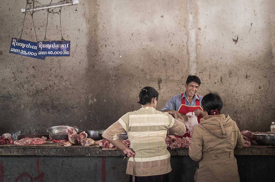 Meat Photograph - The Happy Butcher by Nicolas Petit