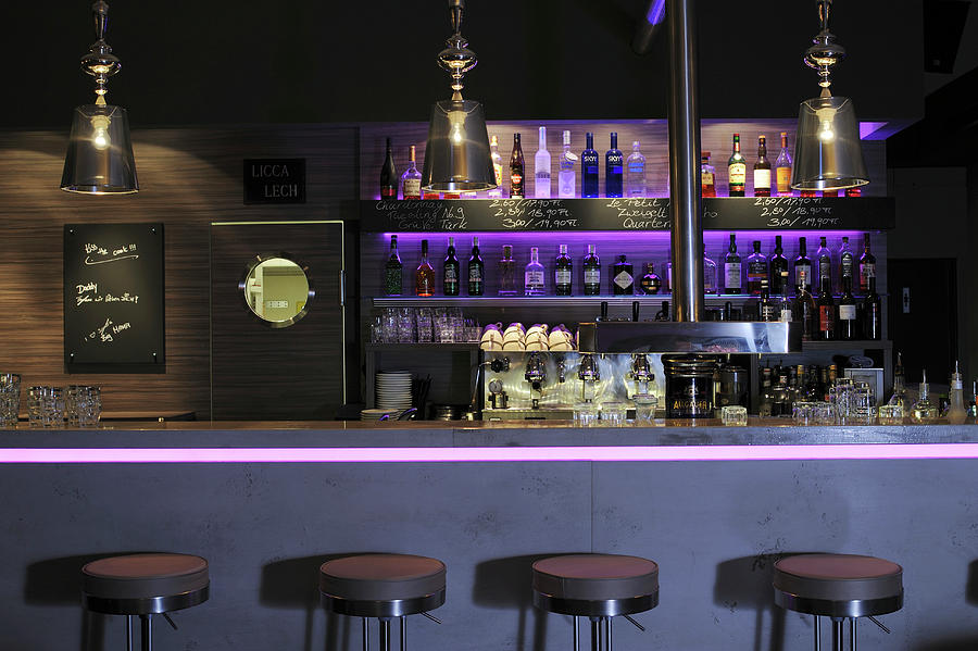 The Interior Of A Bar With Dim Lighting Photograph by Elisabeth Berkau