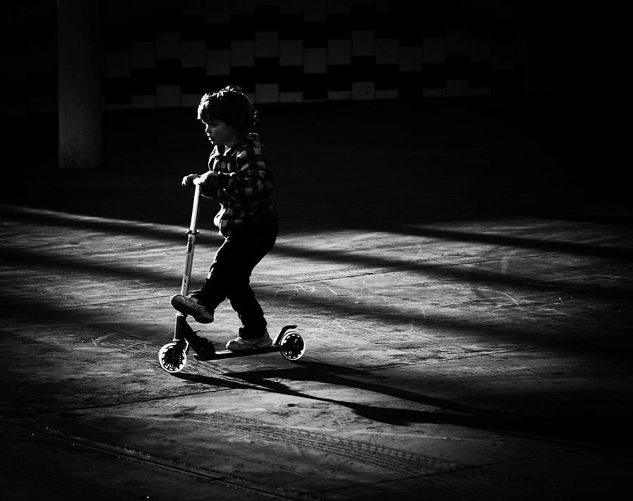 The Kid On Wheels Photograph by Jeroen Van De