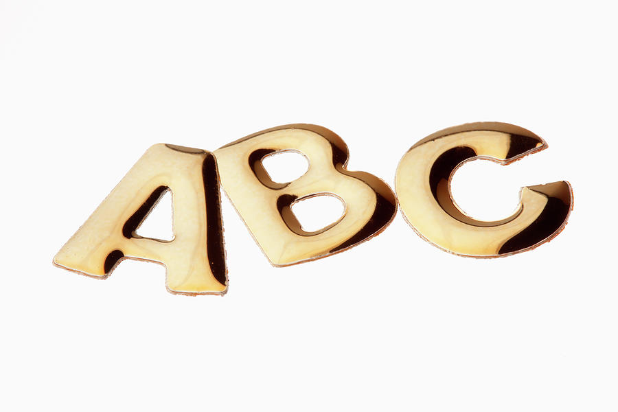 The Letters Abc In Gold Lettering Photograph by Larry Washburn