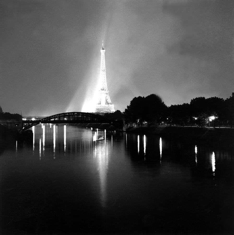 The Lighted Eiffel Tower In 1958 Photograph by Keystone-france