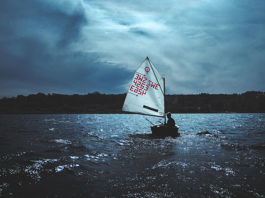 The Lonely Sailor Photograph by Alex Ogazzi