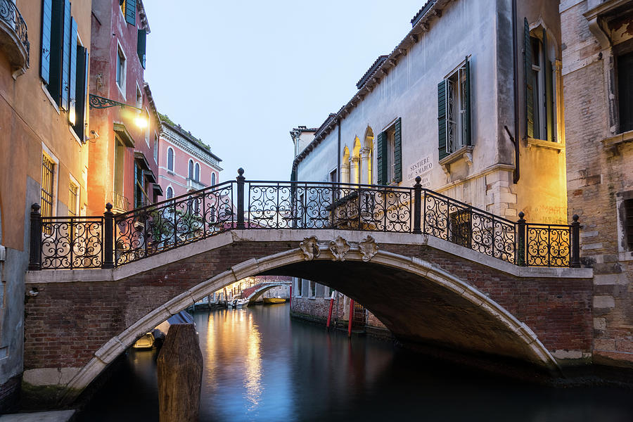 The Magic Of Small Canals In Venice Italy - Beneath A Charismatic Wrought Iron Bridge Photograph