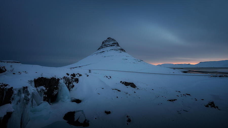 The Majestic Beauty Of Kirkjufell In Winter\s Icy Grip Photograph by Sheila Xu