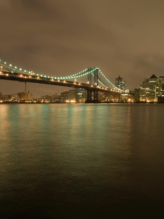 The Manhattan Bridge And The East River Photograph by Jeff Spielman
