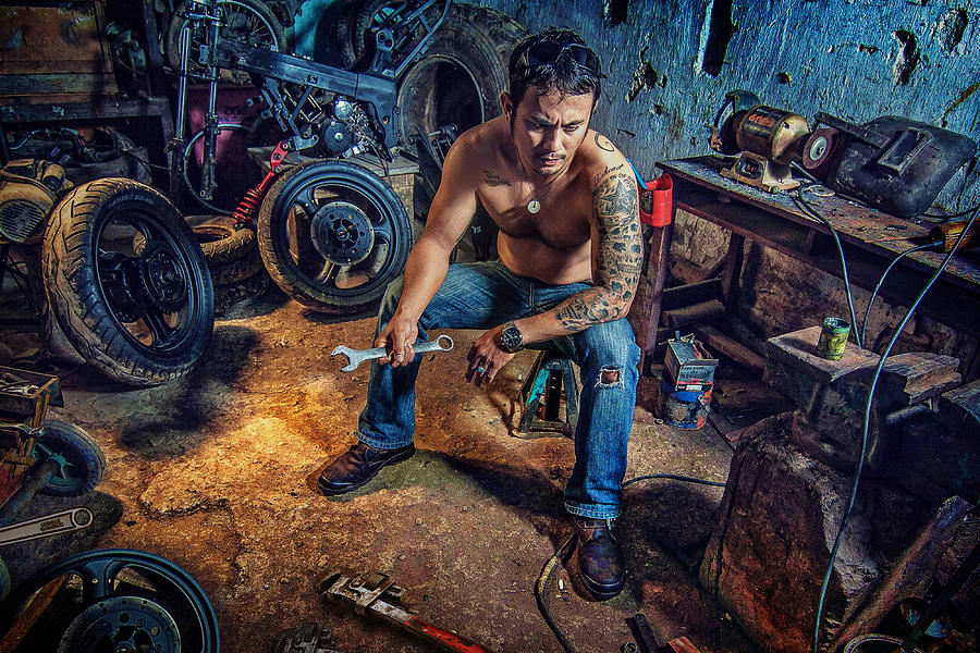 People Photograph - The Mechanic by Ivan Valentino