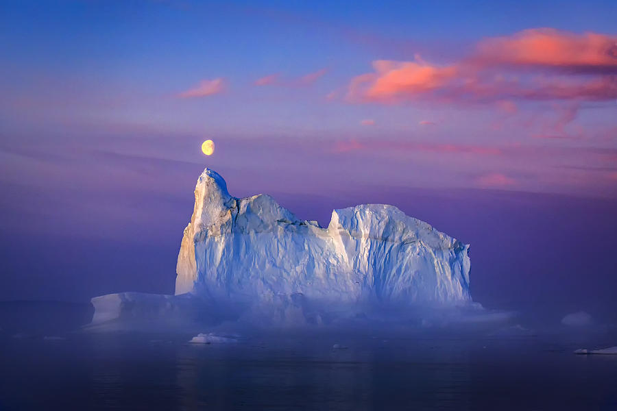 Landscape Photograph - The Midnight Moon And Iceberg In Ilulissat by Raymond Ren Rong Liu
