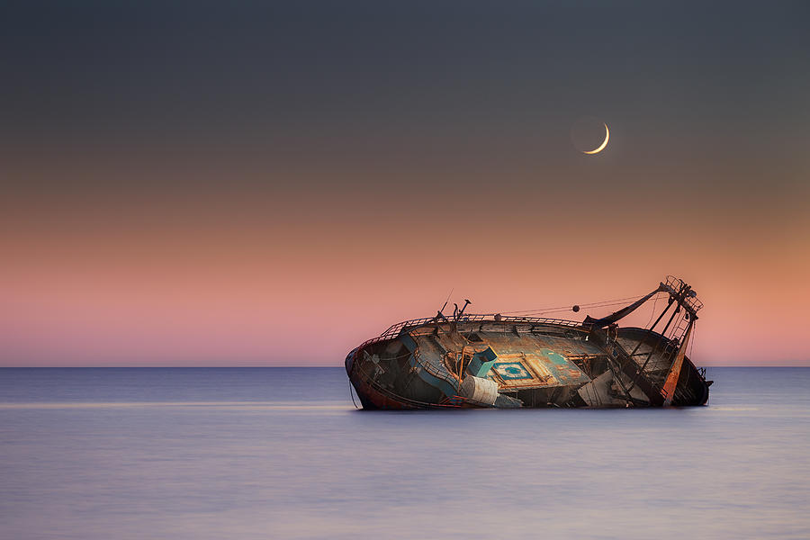 The Moon And The Wreck Photograph by Rico Cavallo