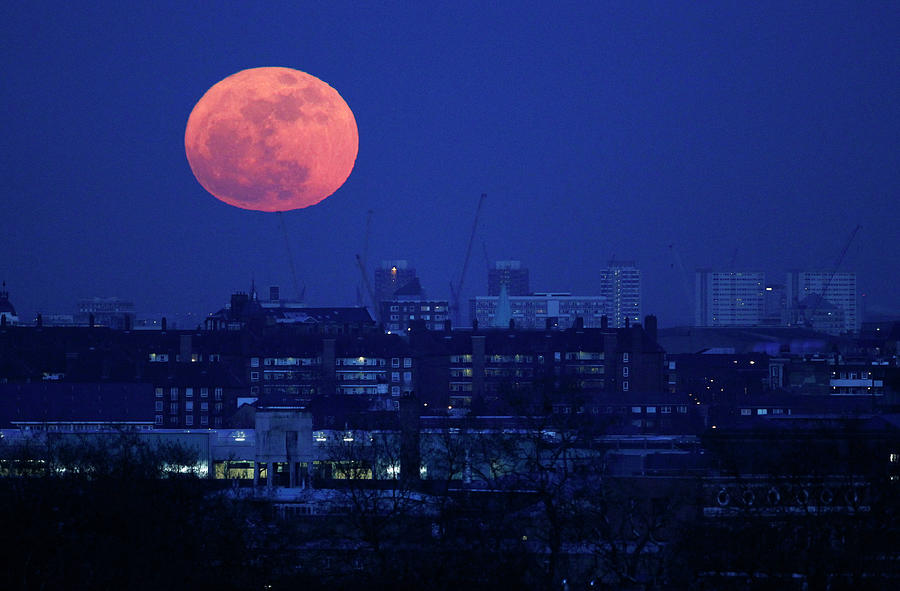 The Moon Rises over East London Photograph by Suzanne Plunkett - Fine ...