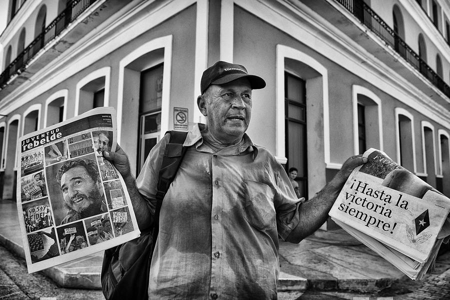 Newspaper Photograph - The Newsdealer by Carlos Lopes Franco