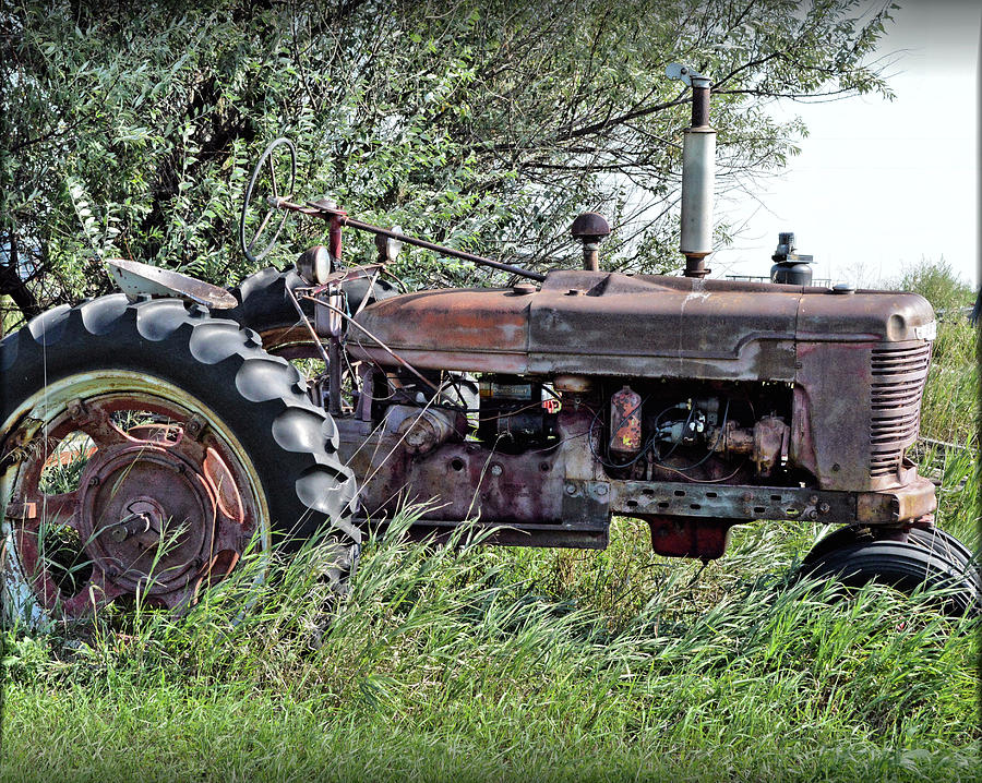 The Ol Farm Tractor Photograph by Debra Kewley