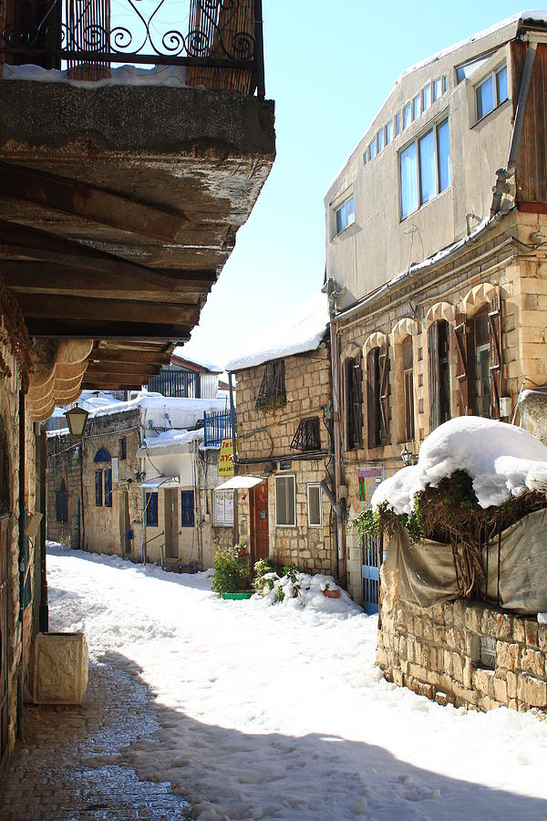 The Old City of Safed in the Galilee in the snow Photograph by Alon Mandel